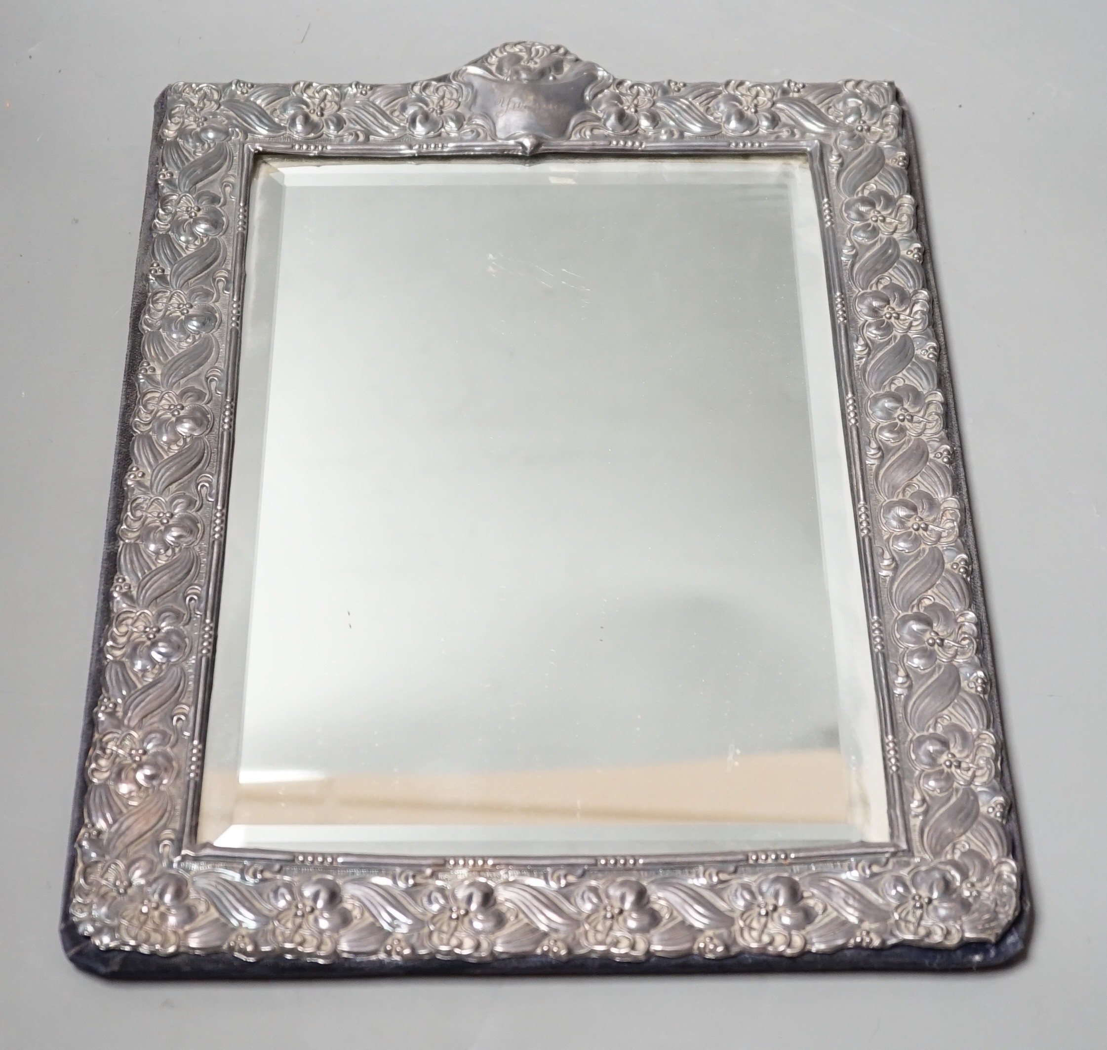 A modern repousse silver mounted rectangular photograph frame, Keyford Frames Ltd, London, 1988, 36.6cm.